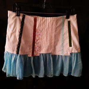 Ariella's mini skirt in size L